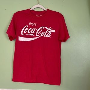 Coca Cola T shirt. Men’s size small. 50% cotton 50% polyester. Red w white.